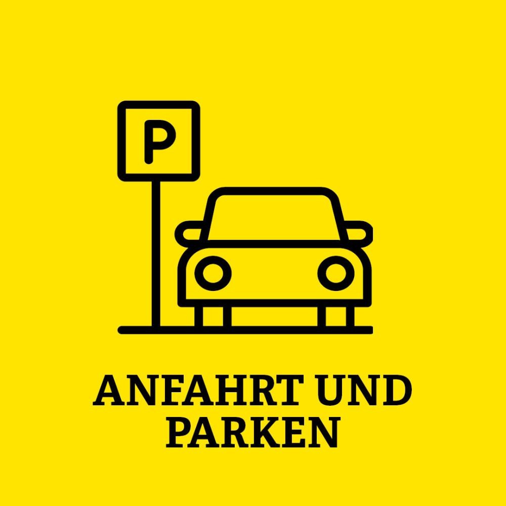 Gelbe Kachel mit Aufschrift Anfahrt und Parken