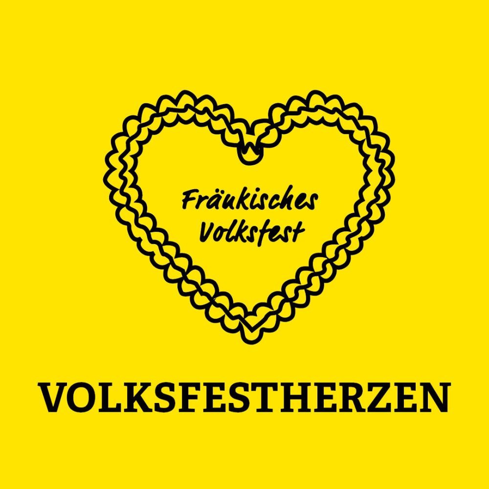 Gelbe Kachel mit Aufschrift Volksfestherzen